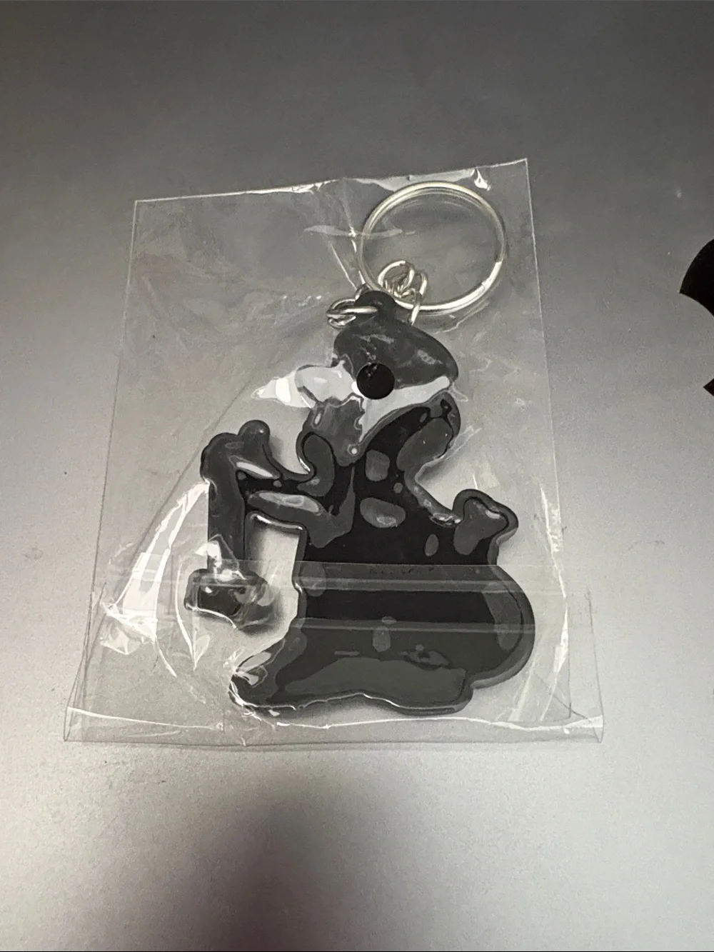 A Exotics Black & Multicolor Cartoon Money Bag Keychain
